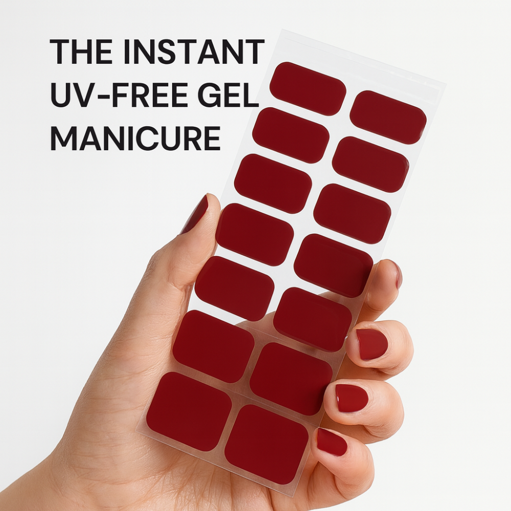 Hand holding a tray of red gel nail applicators with text 'The Instant UV-Free Gel Manicure' on a white background.